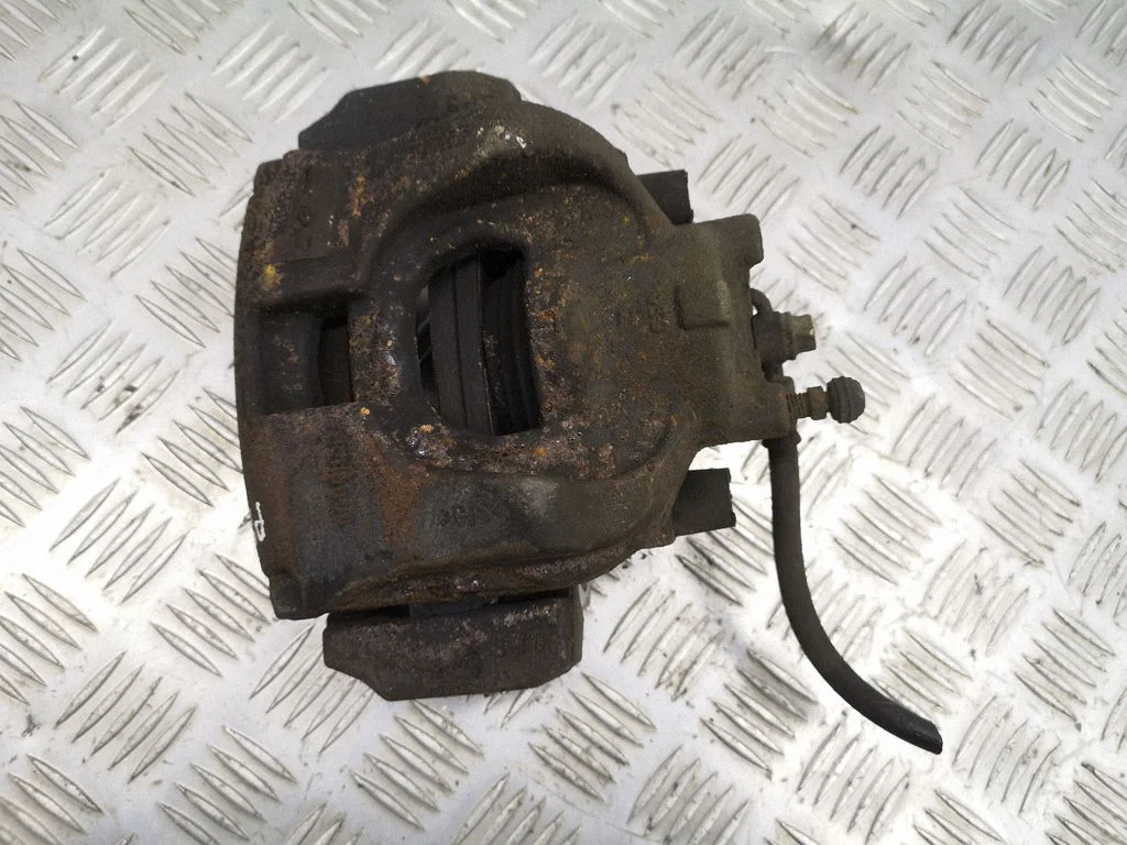 Front brake caliper – left