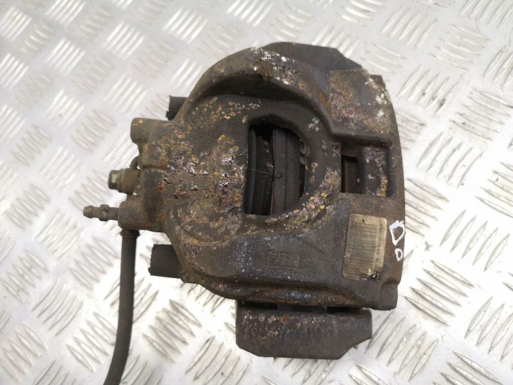 Front brake caliper – right
