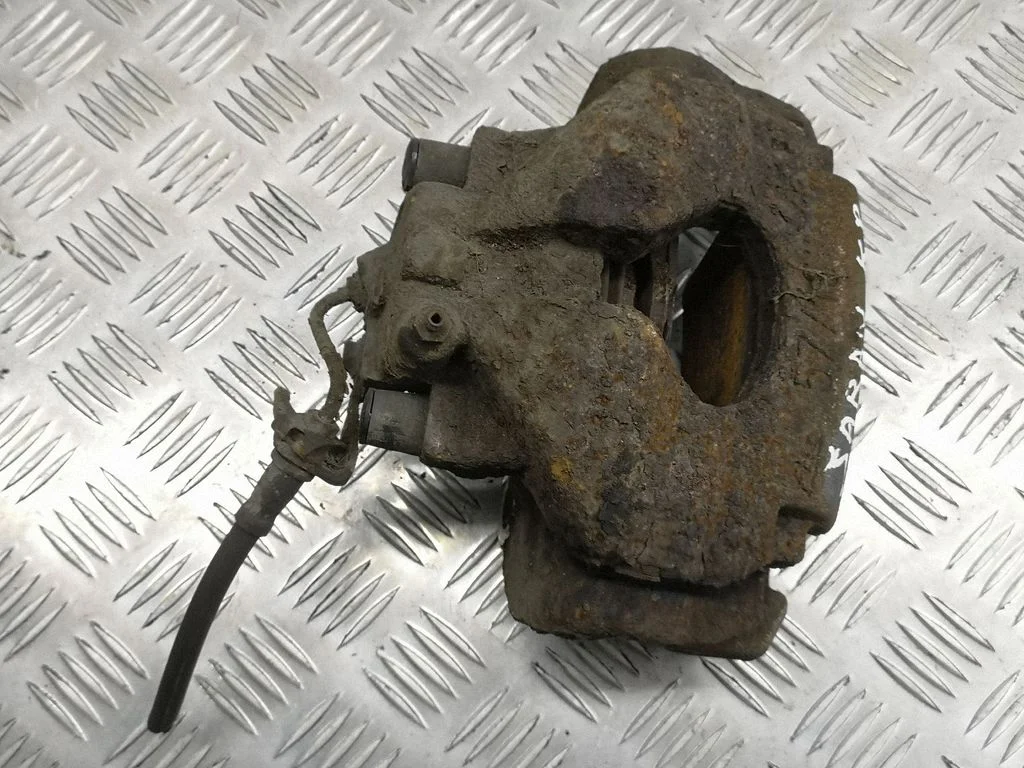Front brake caliper – left