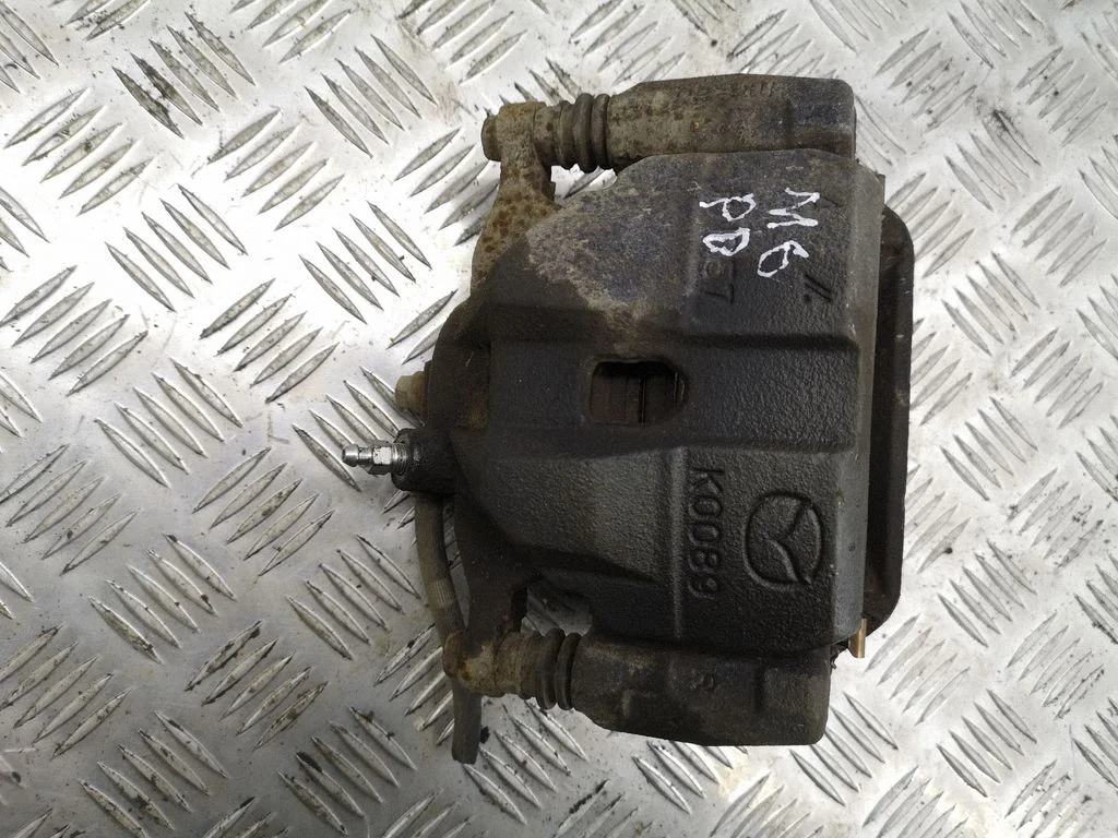 Front brake caliper – right