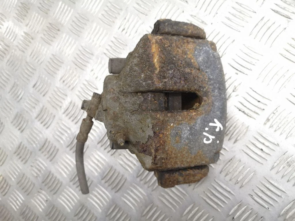 Front brake caliper – left