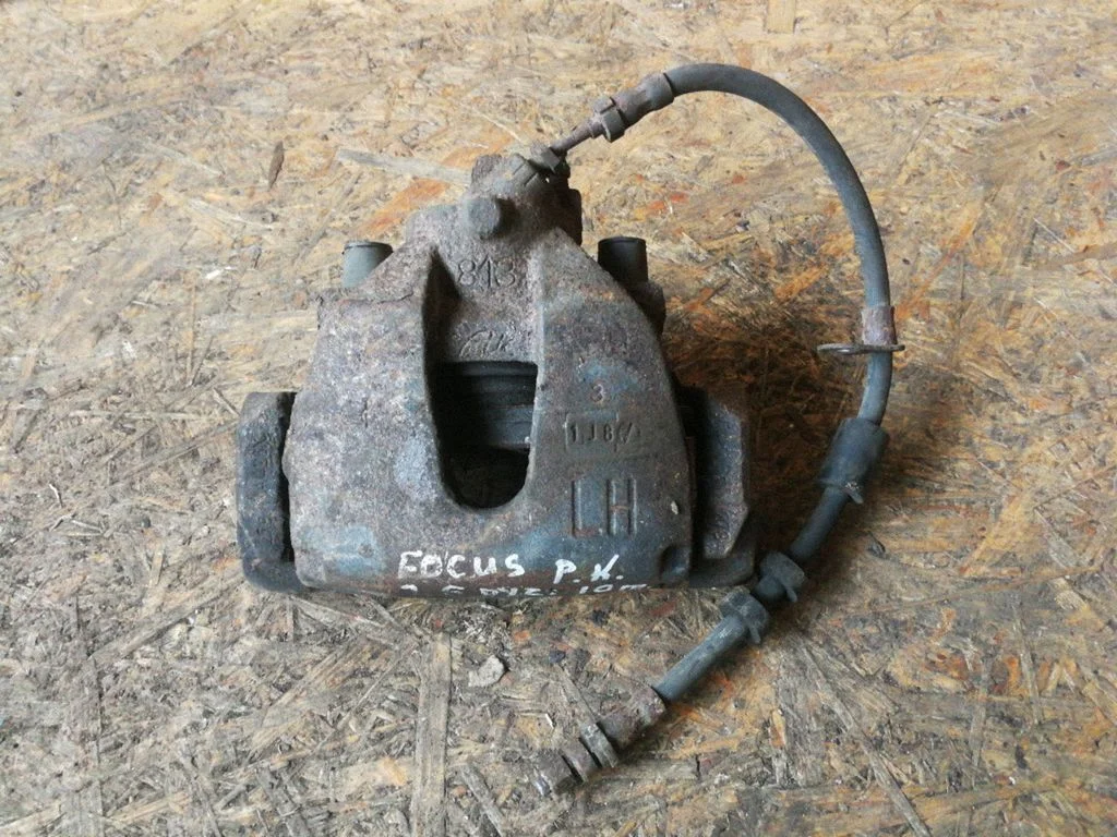 Front brake caliper – left