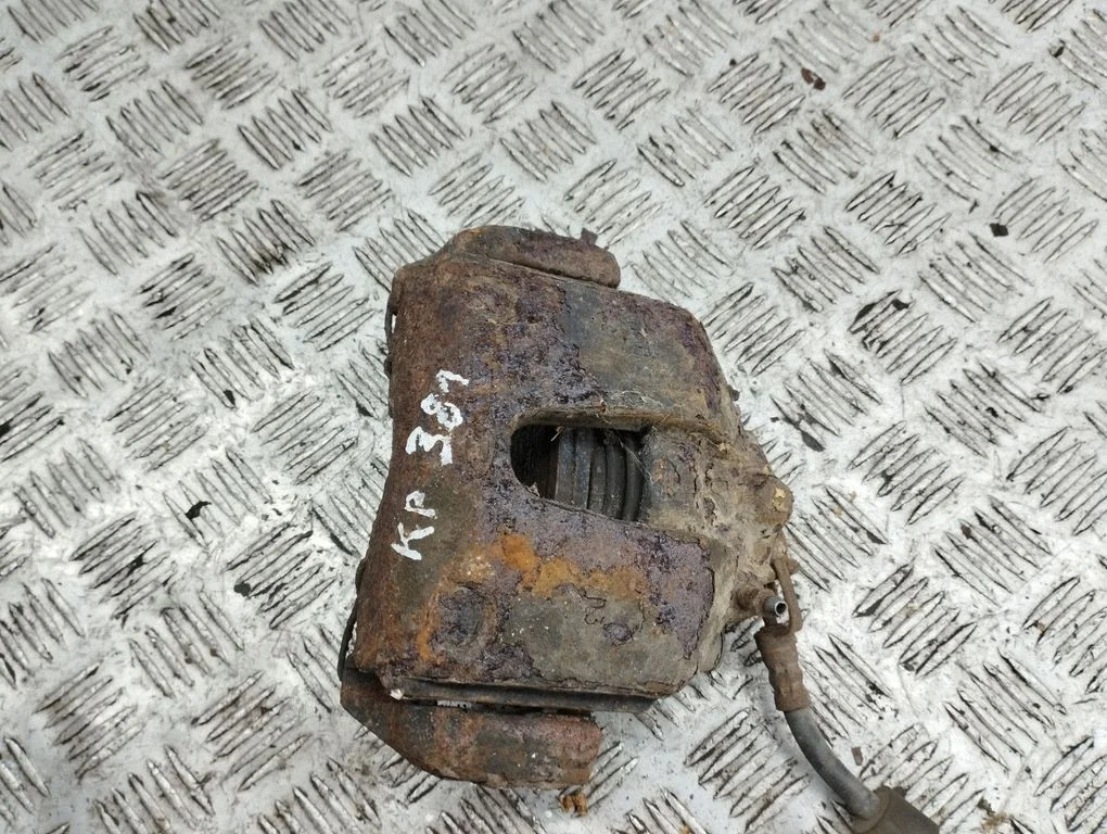 Front brake caliper – front left