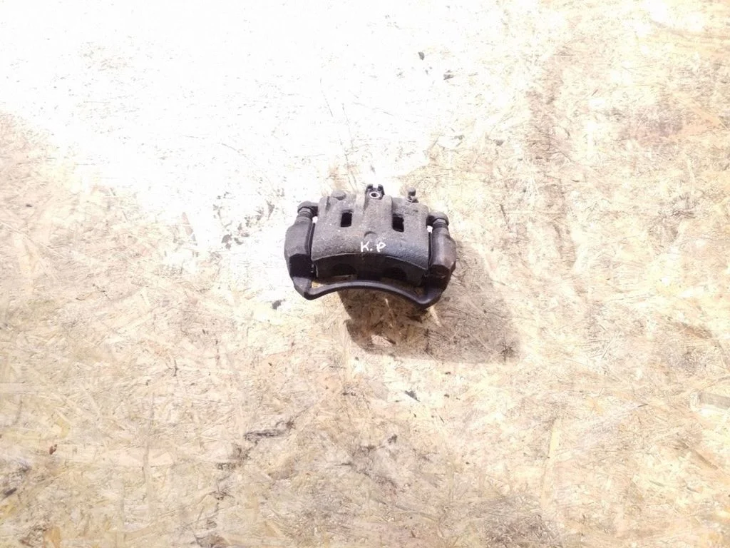 Front brake caliper – left