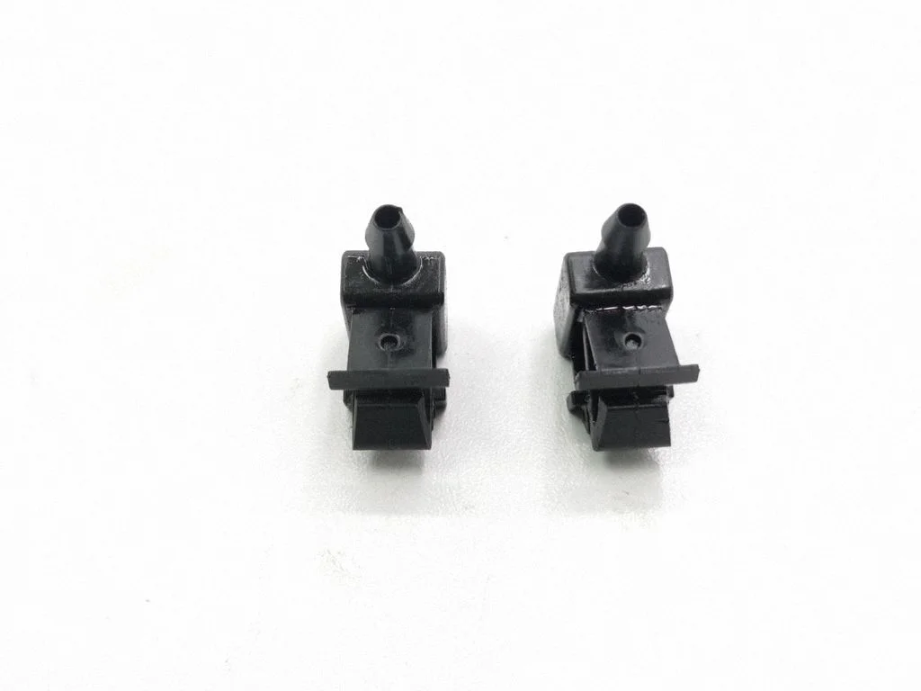 Windshield washer spray nozzle