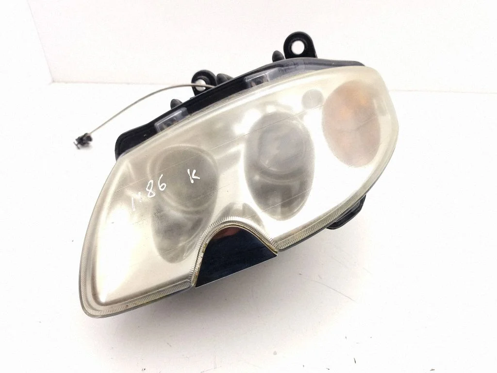 Headlight/headlamp – left