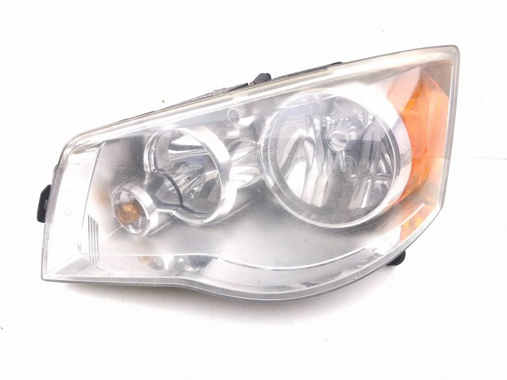 Headlight/headlamp – left