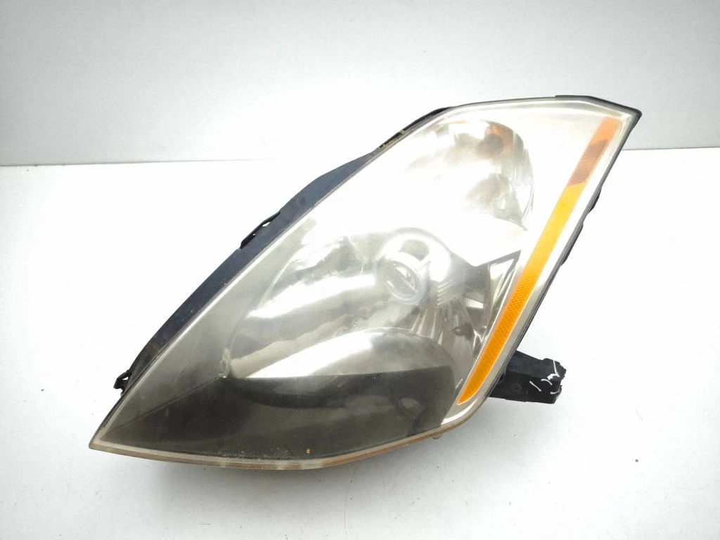 Headlight/headlamp – left