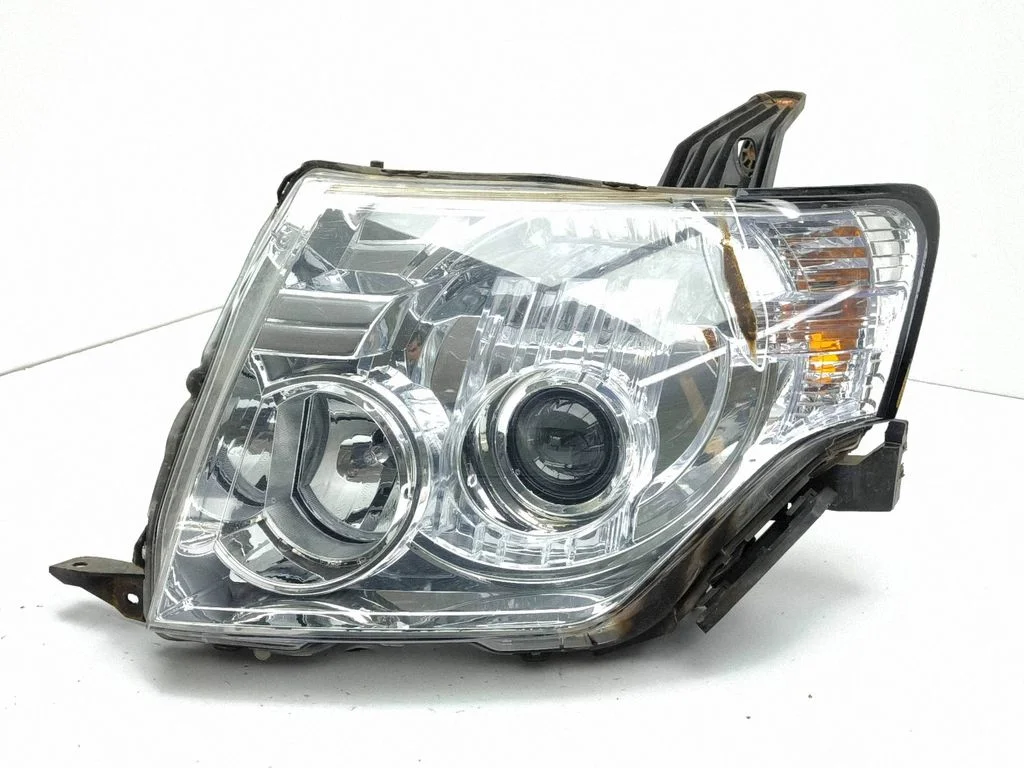 Headlight/headlamp – left