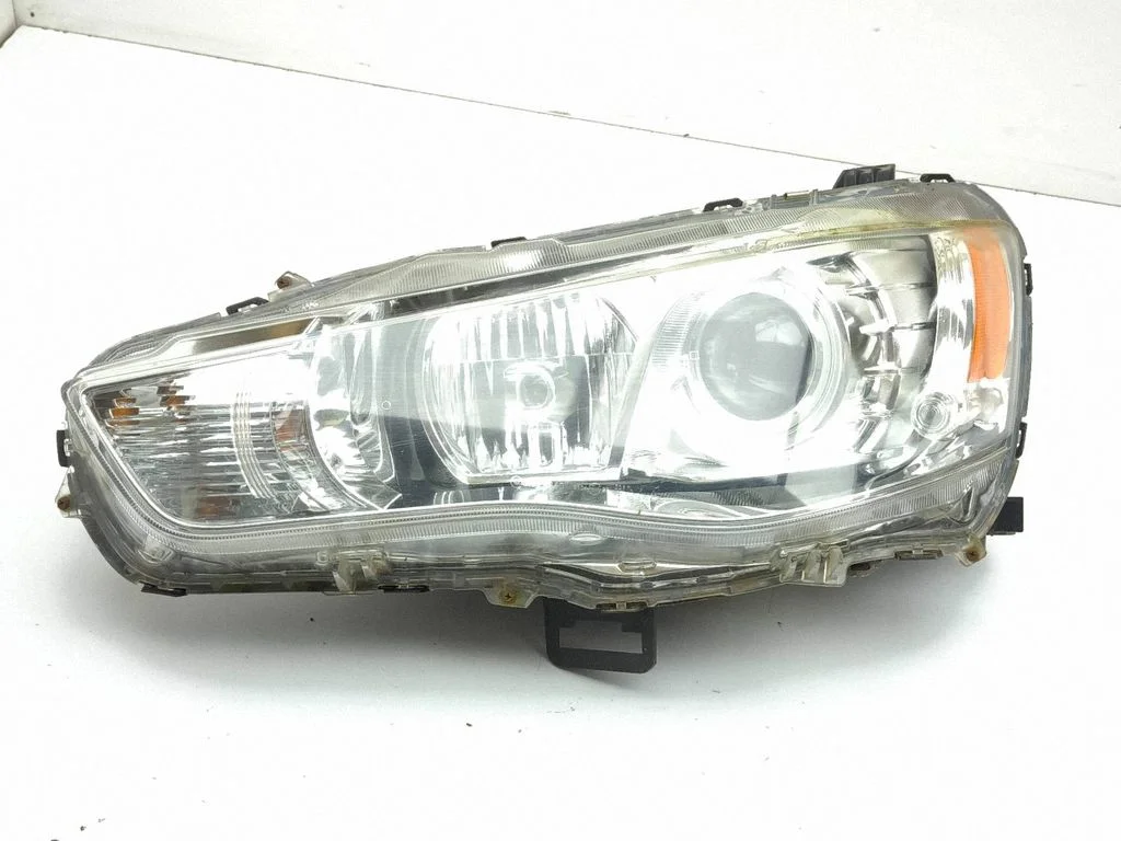 Headlight/headlamp – left