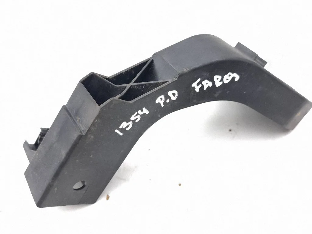 Headlight/headlamp mounting bracket 64127AT000