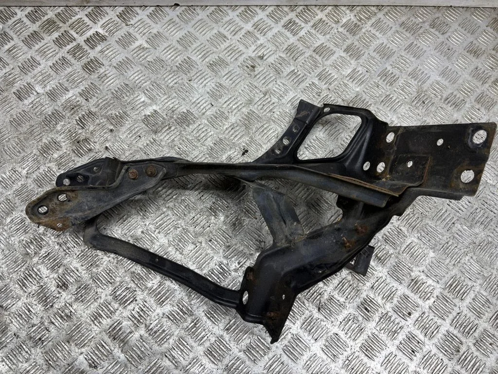 Headlight/headlamp mounting bracket – left