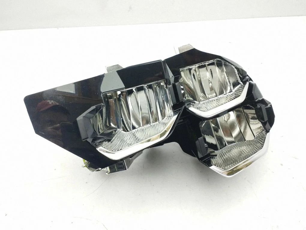Headlight part – left