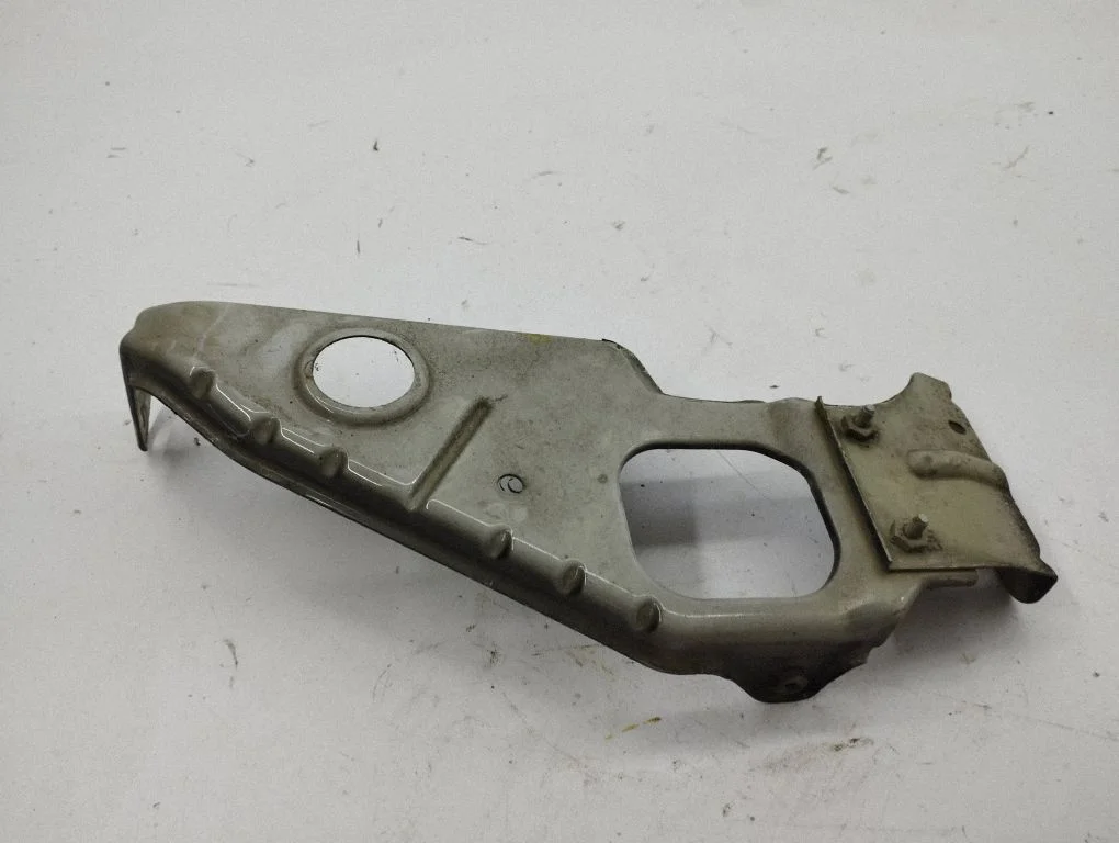 Headlight/headlamp mounting bracket – left