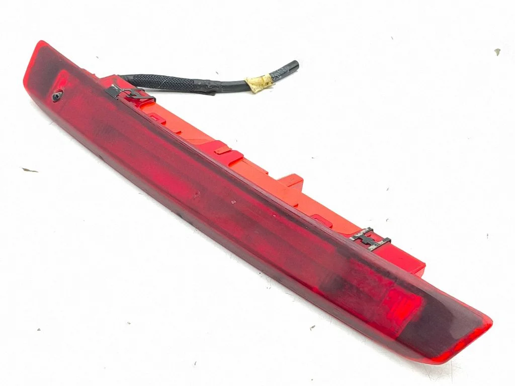 Third/center stoplight BS7113A601CB