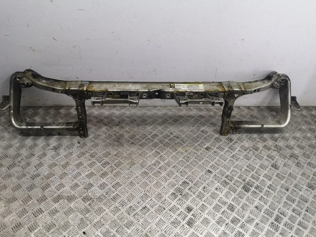Radiator support slam panel