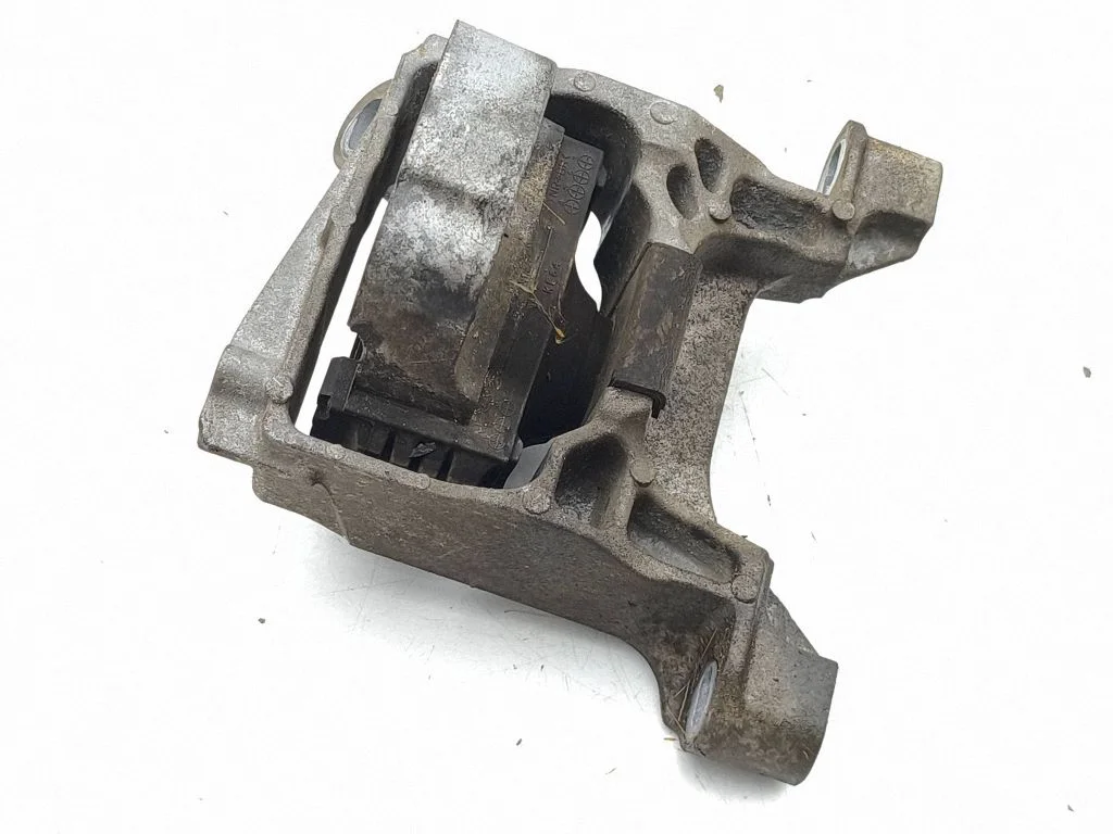 Dzinēja spilvens – kreisā