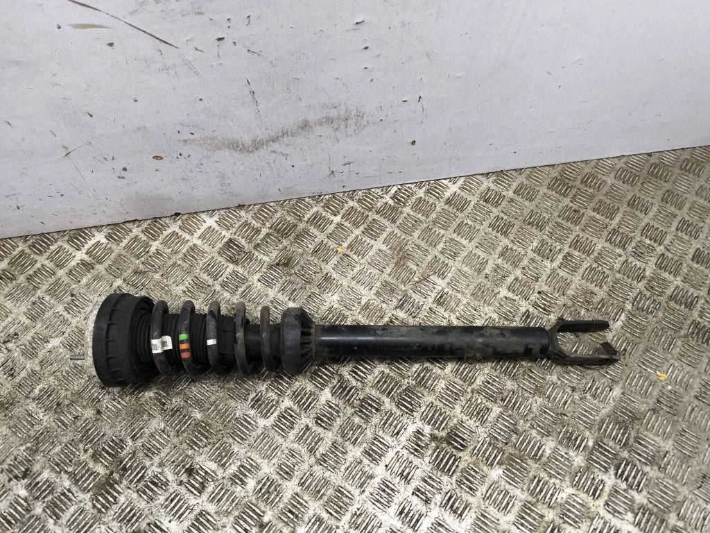 Front shock absorber/damper – left