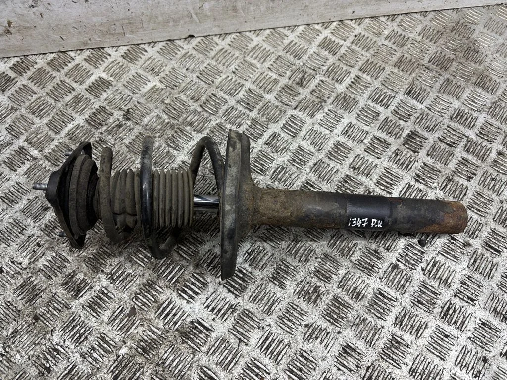 Front shock absorber/damper – left