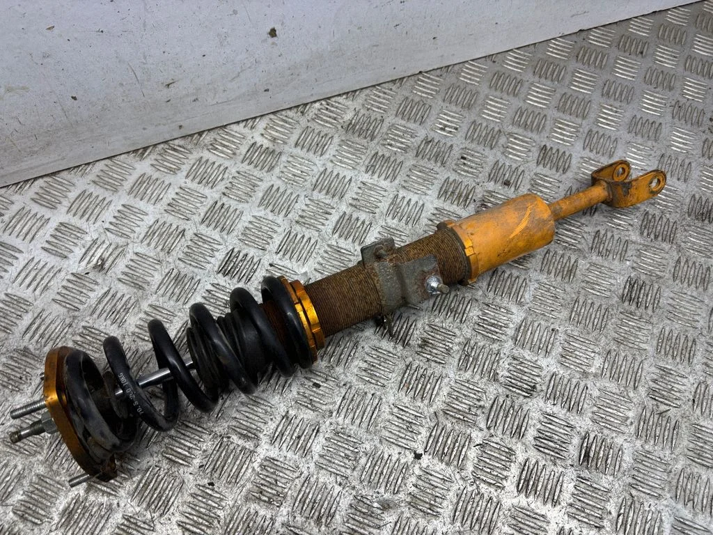Front shock absorber/damper – left