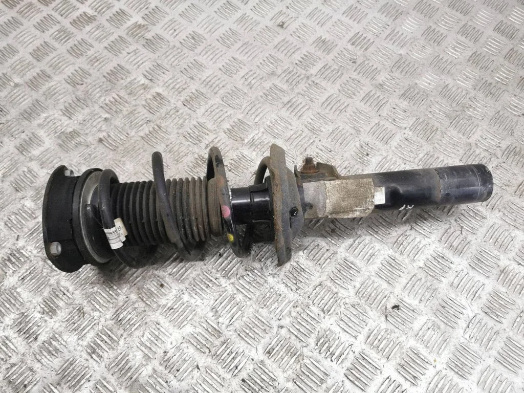 Front shock absorber/damper – left