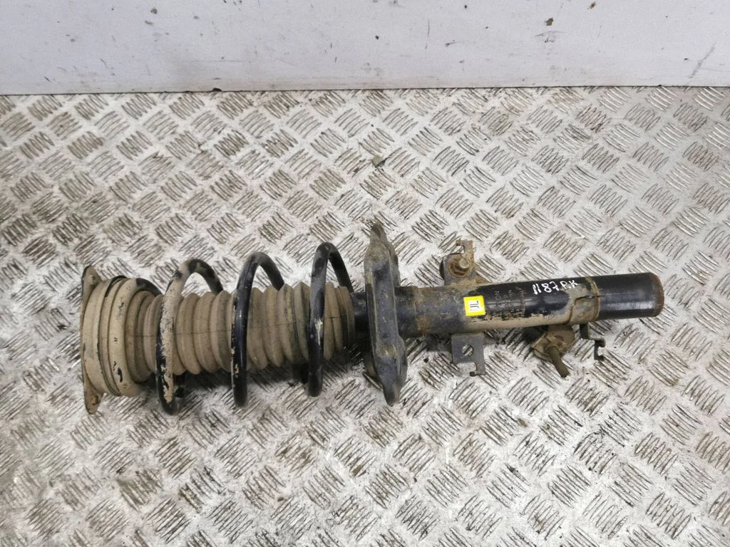 Front shock absorber/damper – left