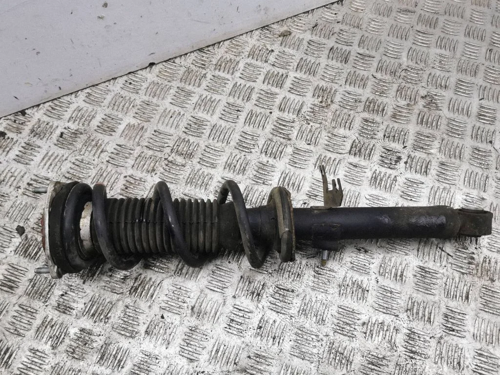 Front shock absorber/damper 561111EA0C