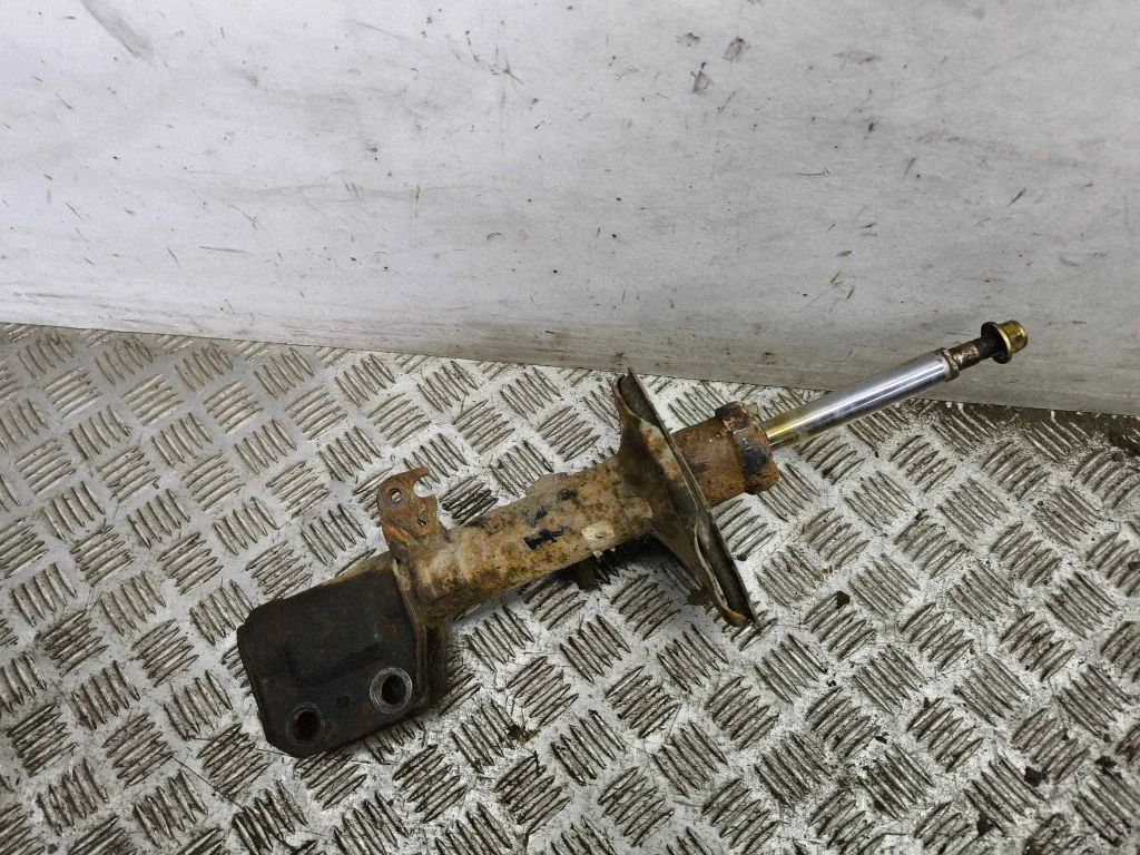 Front shock absorber/damper – left