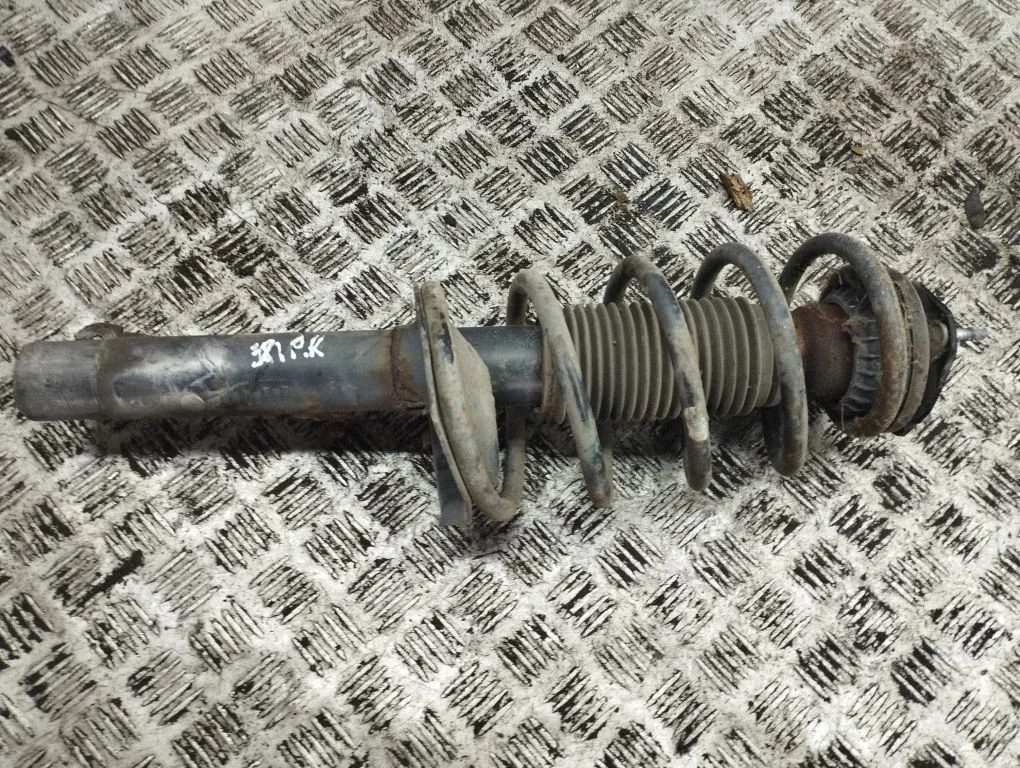 Front shock absorber/damper – left