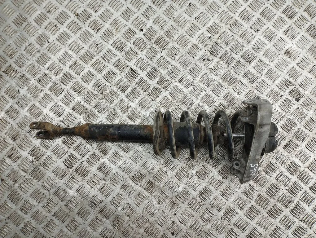 Front shock absorber/damper – left