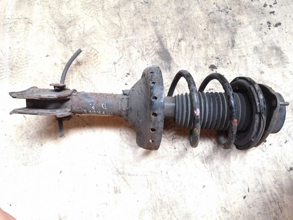 Front shock absorber/damper 20311FE050