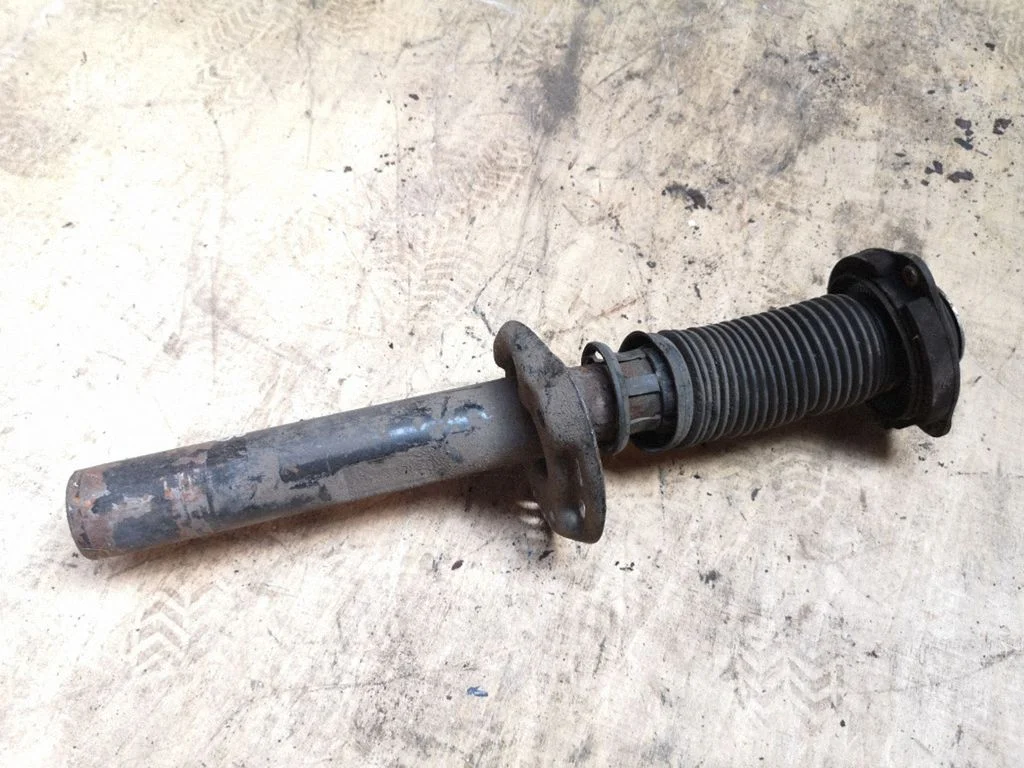 Front shock absorber/damper – left