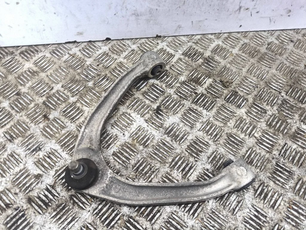 Front lower control arm/wishbone – left