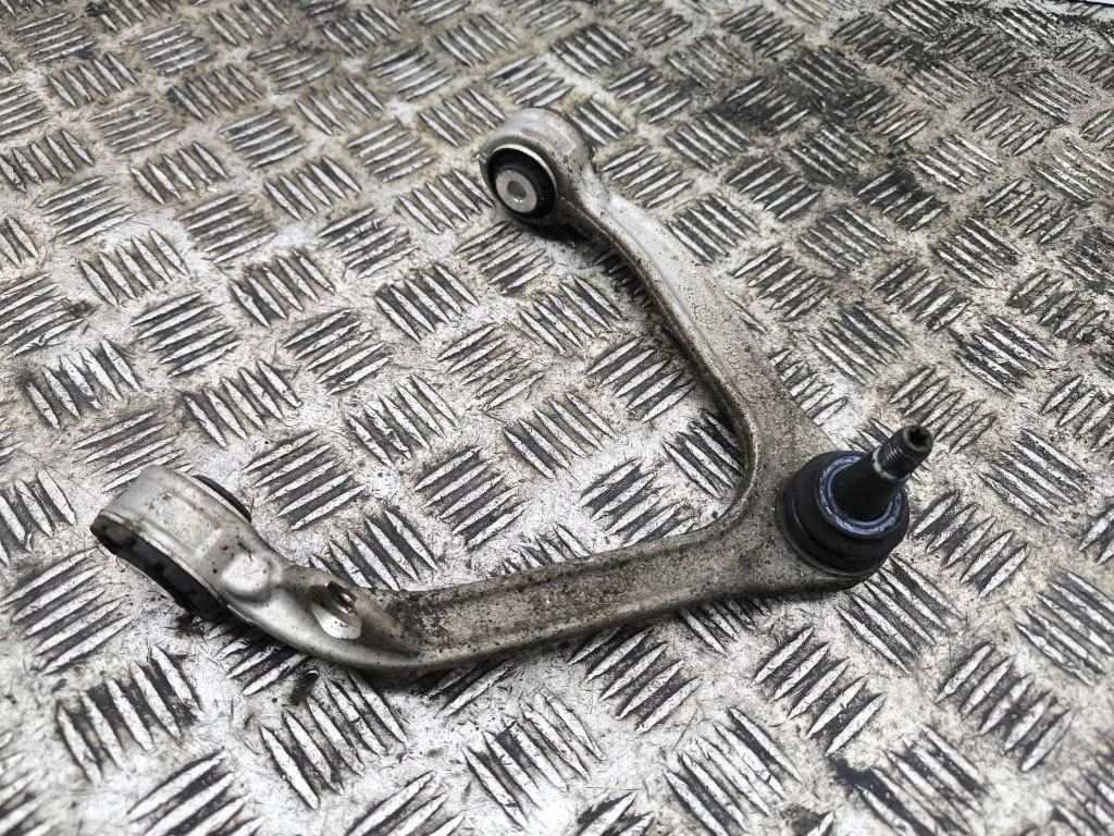 Front lower control arm/wishbone – left