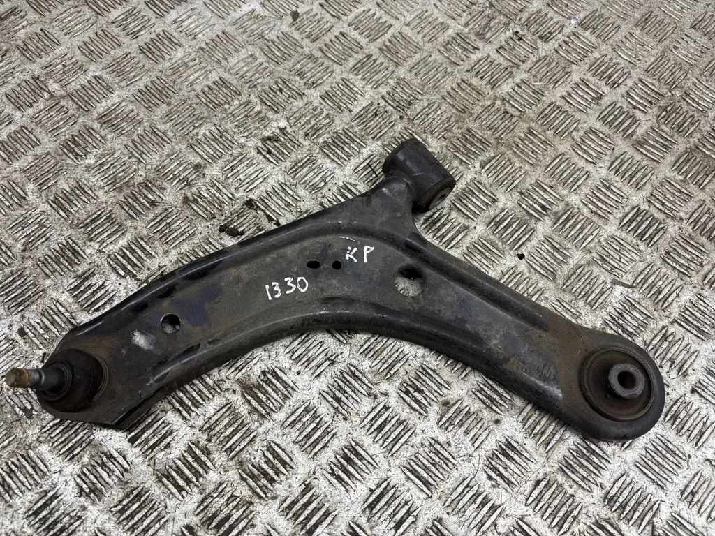 Front lower control arm/wishbone – left