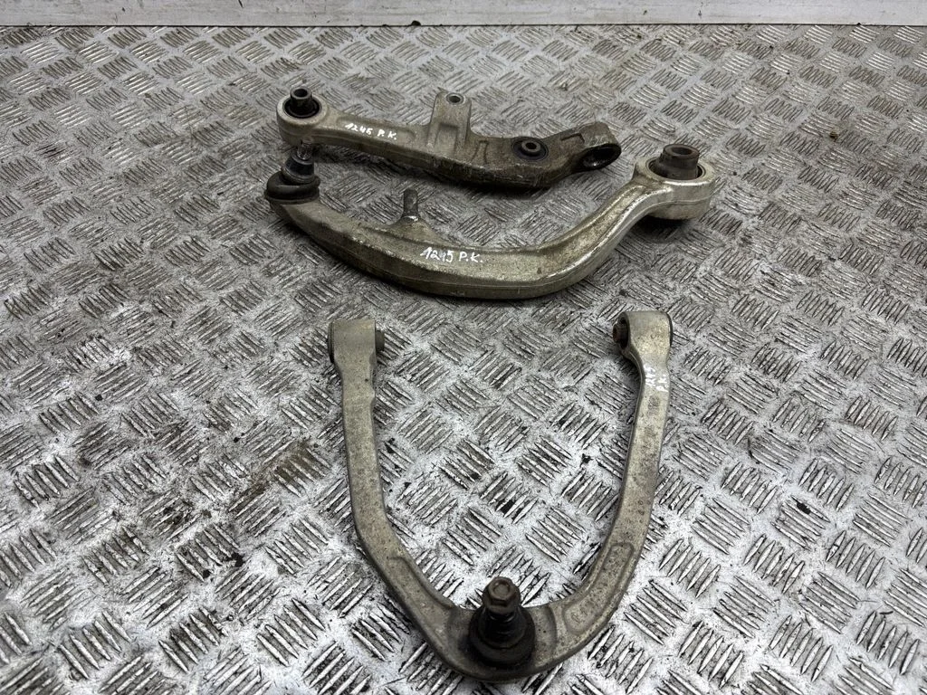 Front lower control arm/wishbone – left