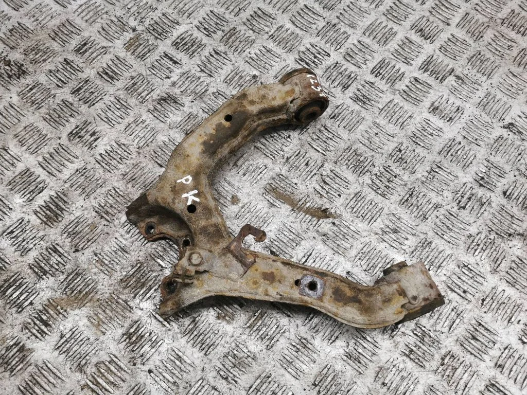 Front lower control arm/wishbone – left