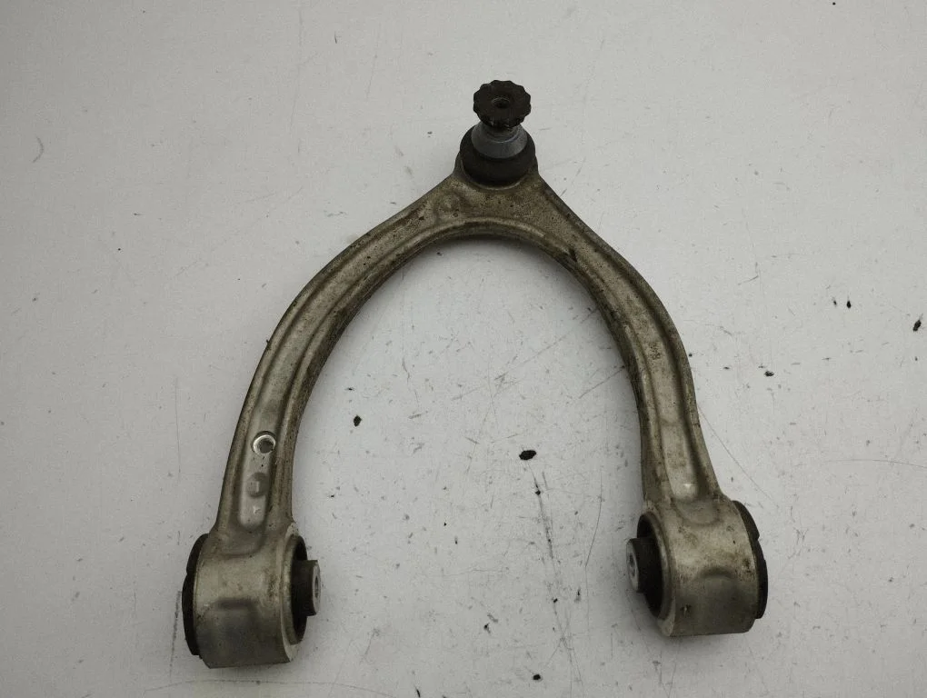 Front lower control arm/wishbone – left