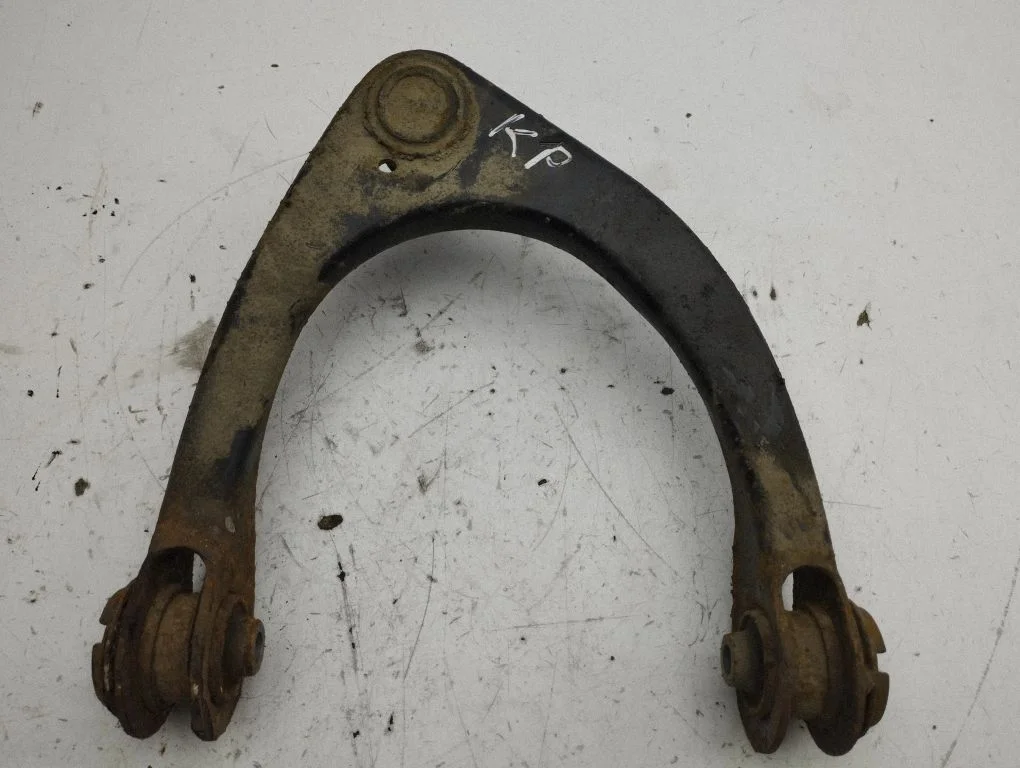 Front lower control arm/wishbone – left