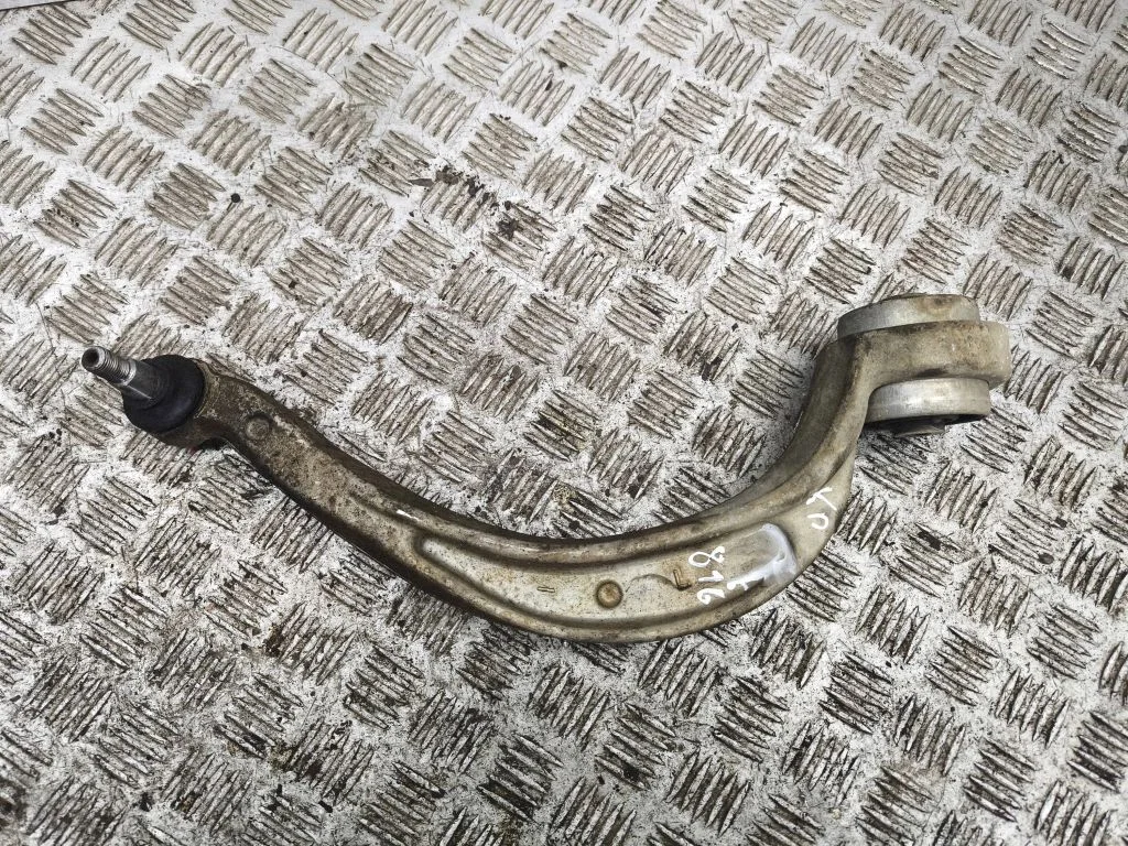 Front lower control arm/wishbone – left