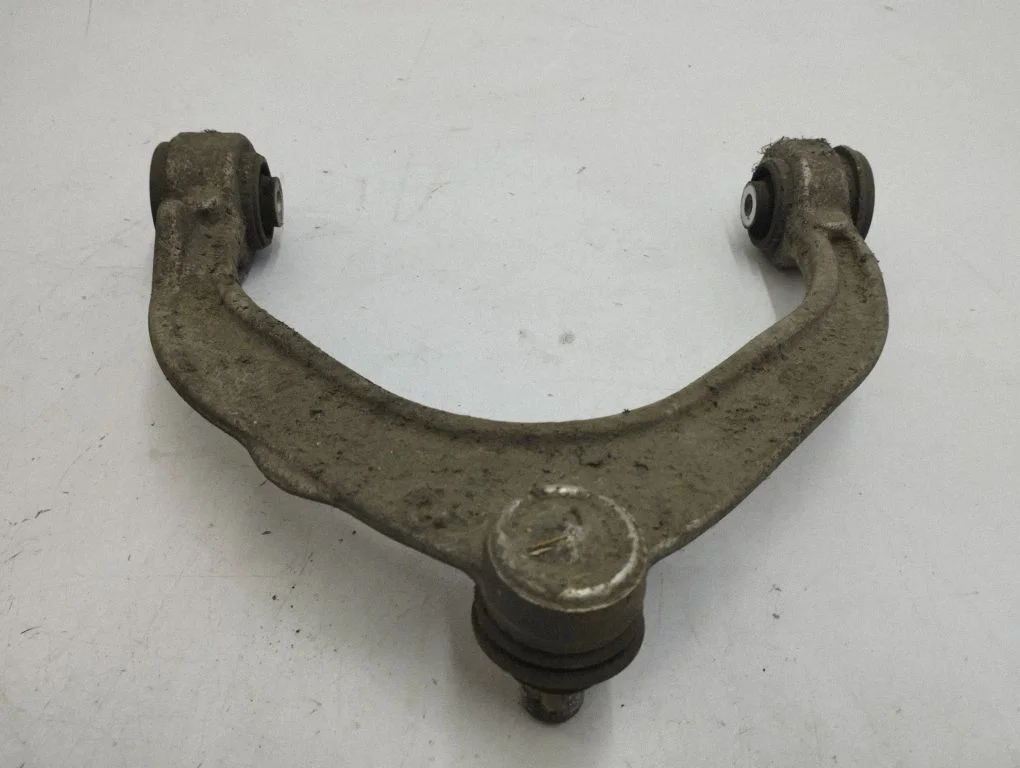 Front lower control arm/wishbone – left