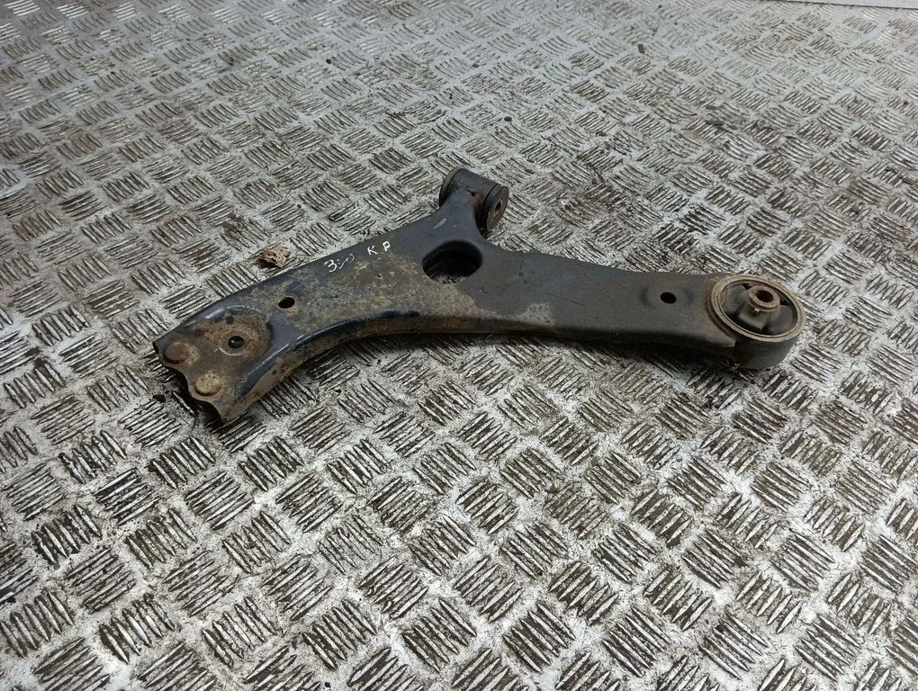 Front lower control arm/wishbone – left