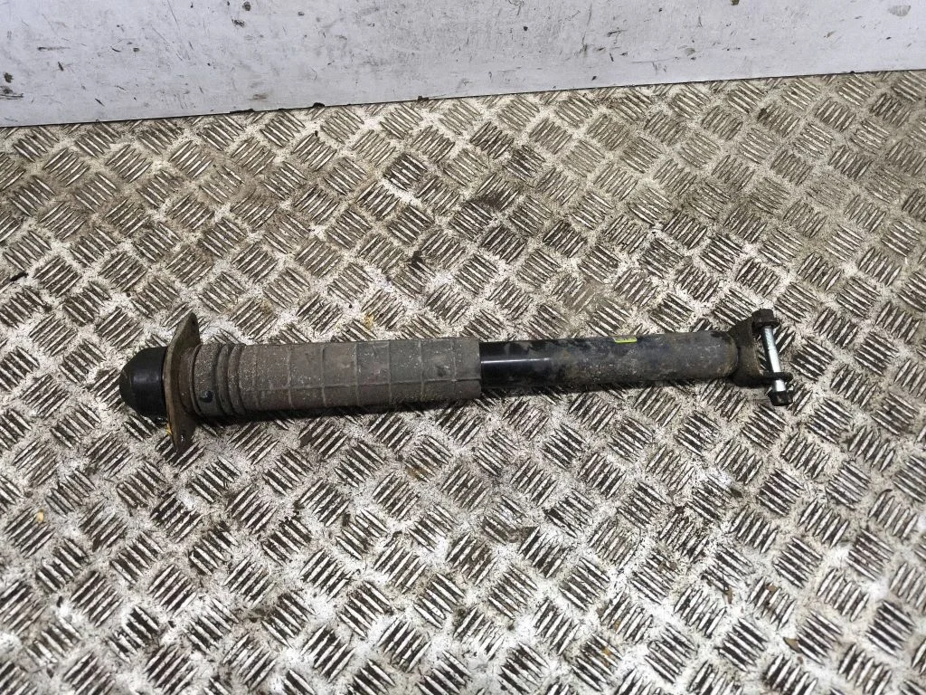 Rear shock absorber/damper 562101EA1C