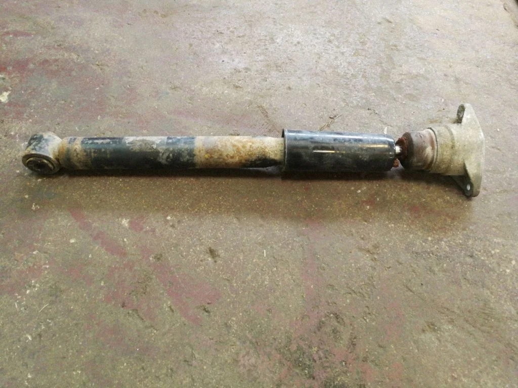 Rear shock absorber/damper – left
