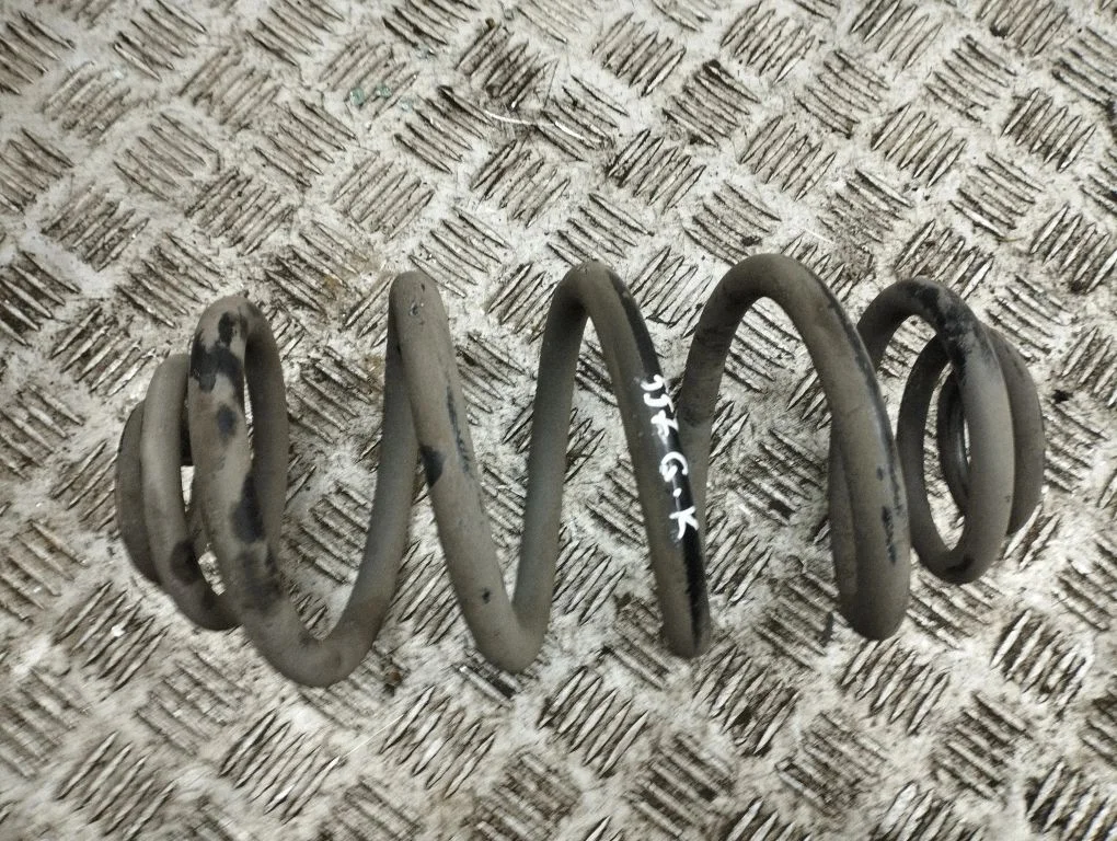 Rear coil spring – left