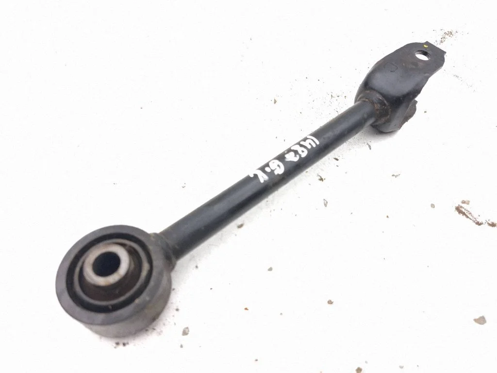 Rear upper control arm/wishbone – left