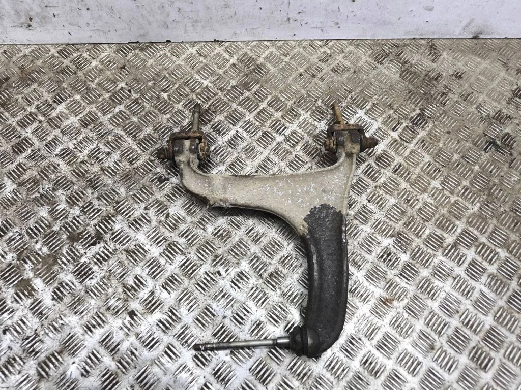 Rear upper control arm/wishbone – left