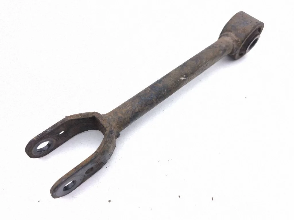 Rear upper control arm/wishbone – left