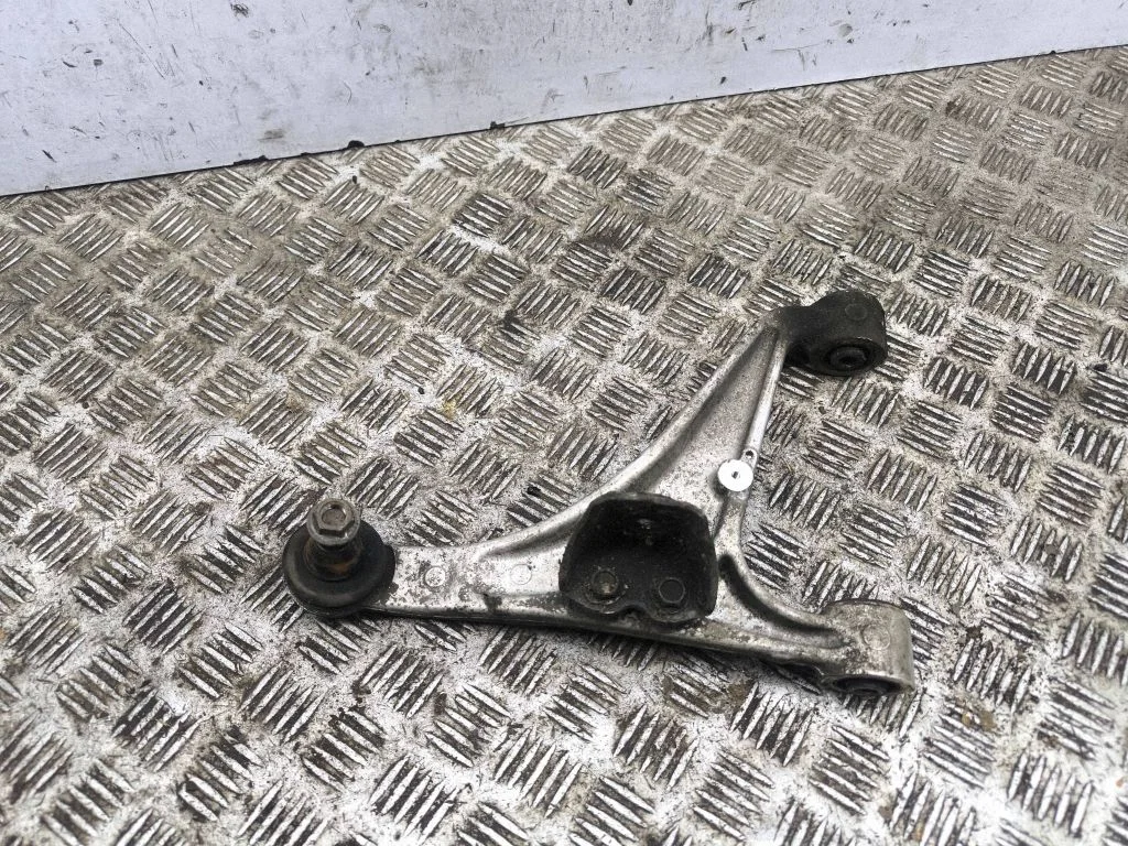 Rear upper control arm/wishbone – left