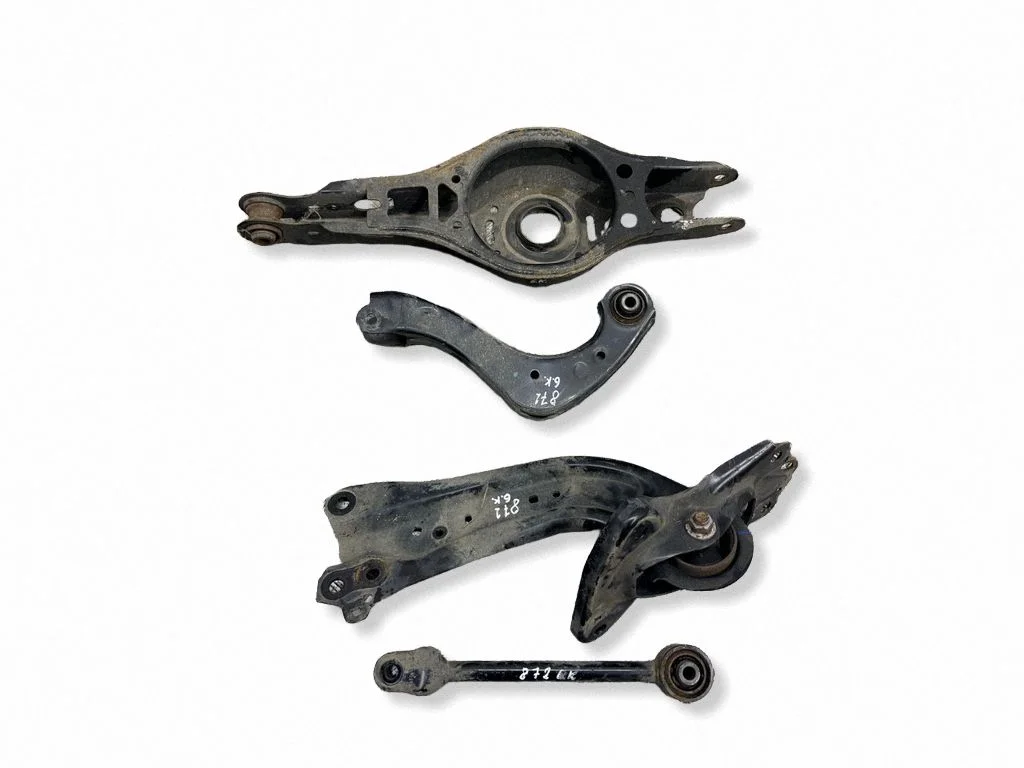 Rear upper control arm/wishbone – left